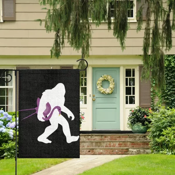 Garden Flag - Bigfoot Carrying a Pink Flamingo